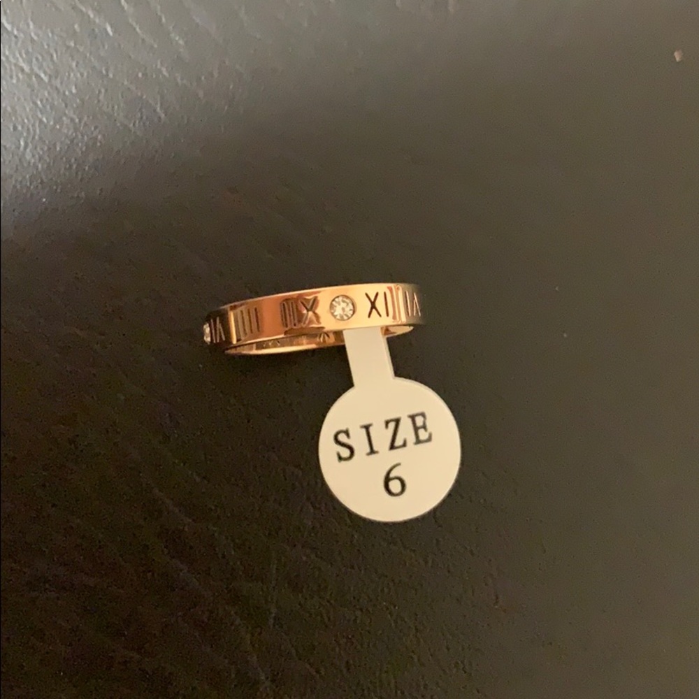 Rose gold Roman numerical ring with diamonds